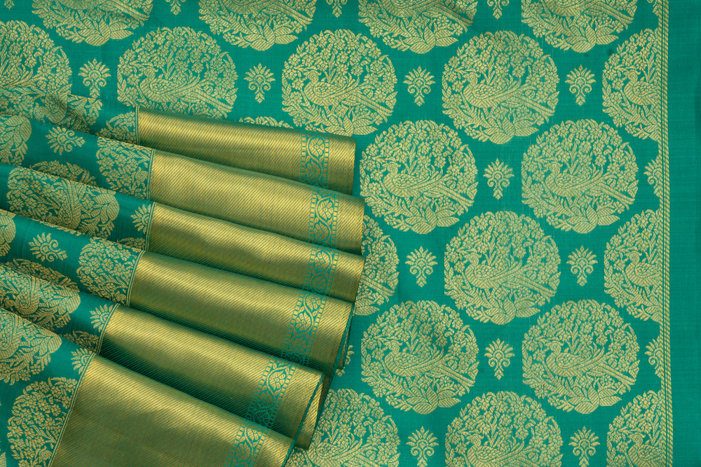 5 Ways to Style a Bottle Green Kanchipuram Silk Saree for a Royal Look